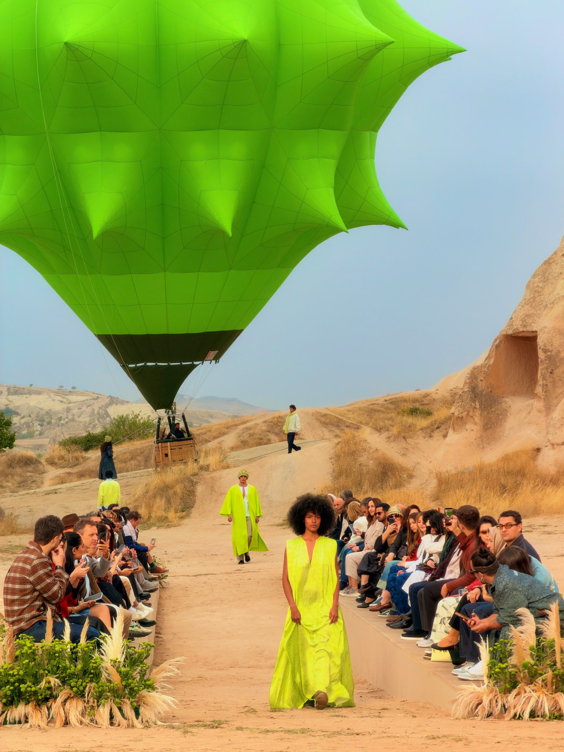 apple-les-benjamins-fashion-show-models-walking-down-runway-in-green-photogridjpgxlarge-2x-609